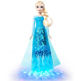 Disney Frozen Light-Up Singing Elsa Doll with a glowing blue skirt and blue light patterns below.