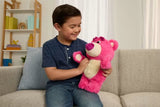 Disney Pixar Toy Story 30th Anniversary Lotso Feature Plush on a sofa with a child