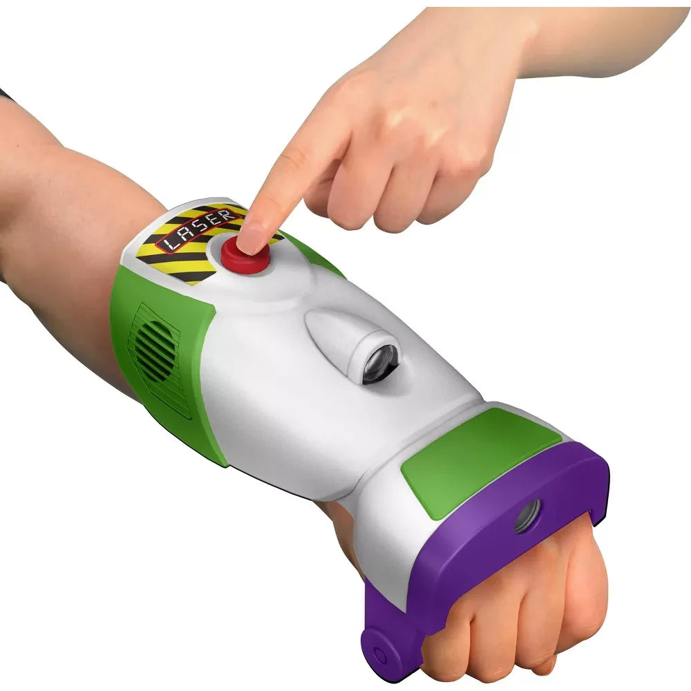 Space ranger laser gauntlet worn on a wrist with a finger pressing the red top button