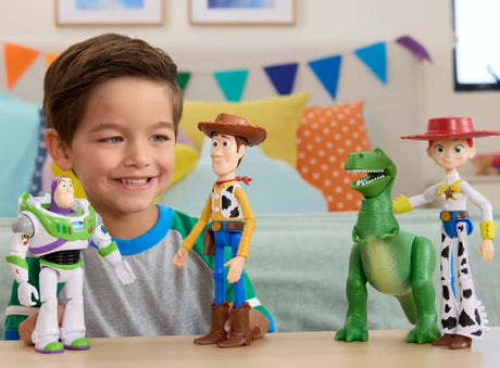 Child holding Disney Pixar Toy Story Buzz Lightyear figure with Woody, Rex and Jessie figures in the background
