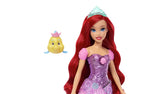 Disney Princess Ariel with long red hair, sparkling purple bodice, tiara and Flounder