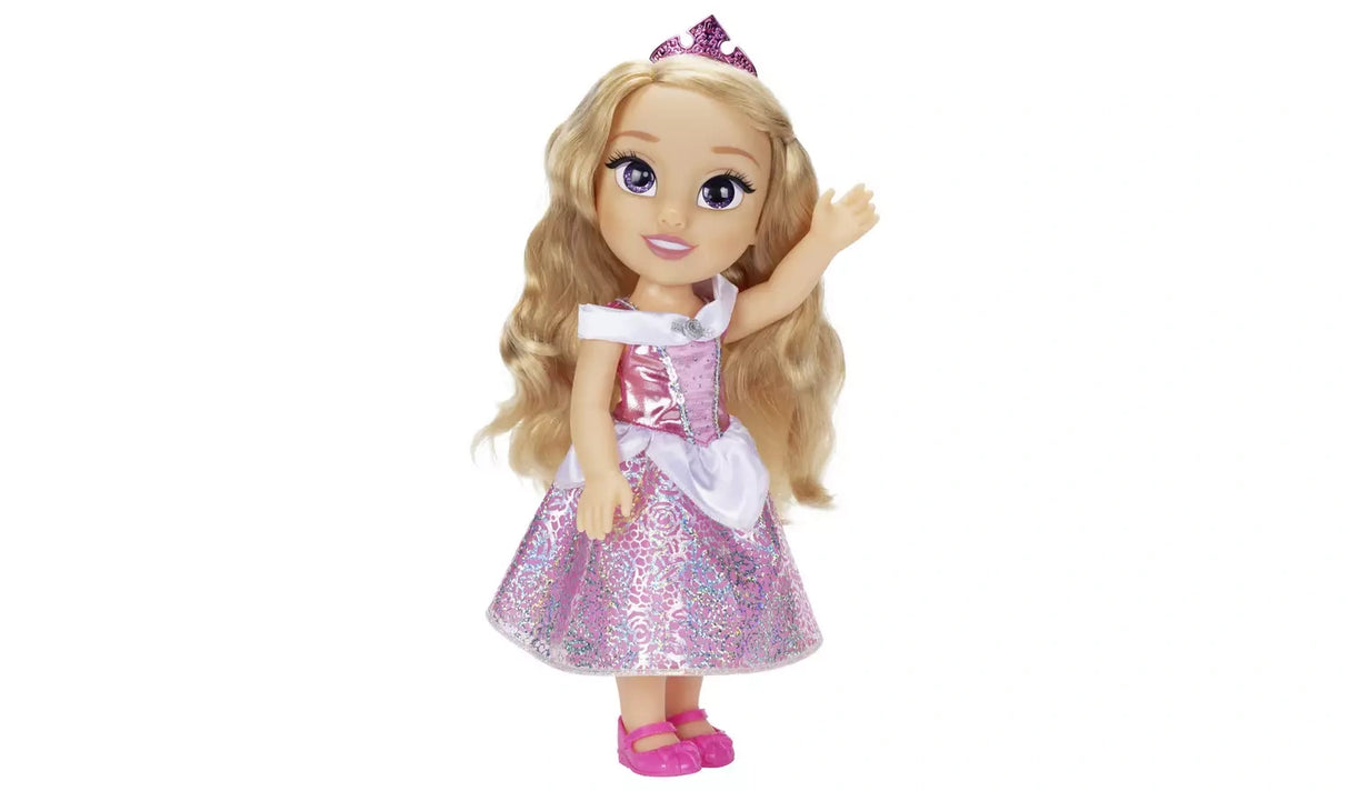 Disney Princess Aurora doll in a pink dress and tiara with one arm raised
