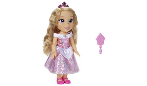 Disney Princess Aurora doll wearing a pink dress and tiara beside a pink hand mirror
