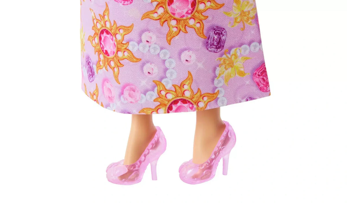 Disney Princess Jewel Reveal Rapunzel close view of jewel print skirt and pink heeled shoes