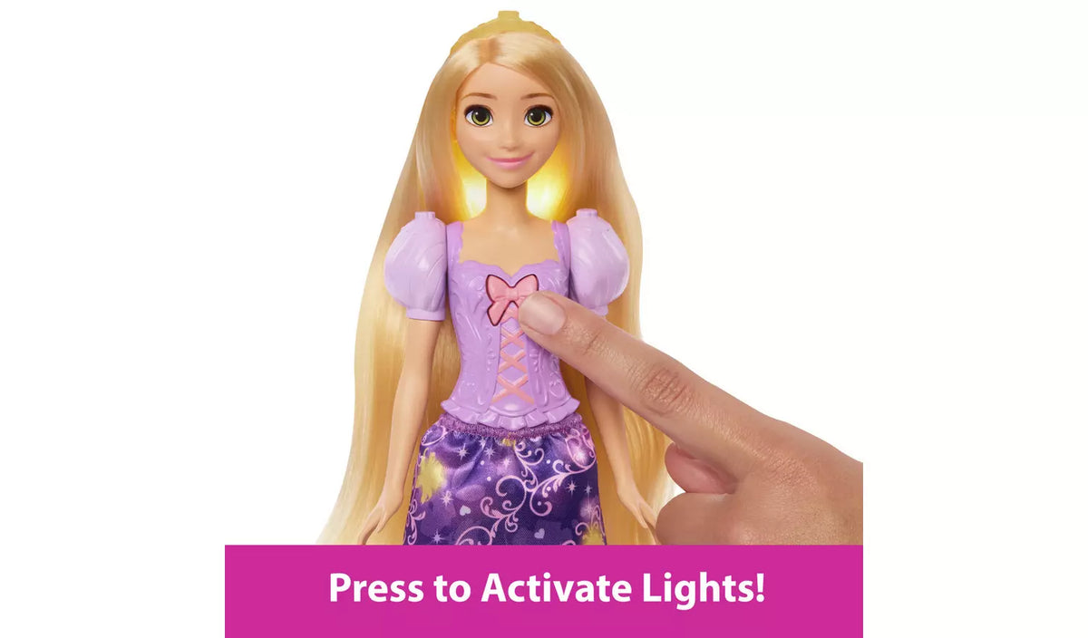 Disney Princess Magical Hair Rapunzel Fashion Doll showing the button that activates the hair lights