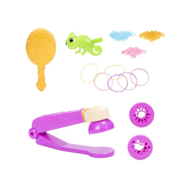 Rapunzel styling accessories with gold hairbrush, Pascal figure, hair clips, hair bands, purple styling tool and two design attachments