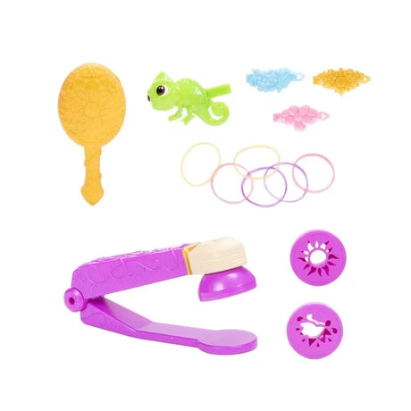 Rapunzel styling accessories with gold hairbrush, Pascal figure, hair clips, hair bands, purple styling tool and two design attachments
