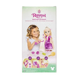 Back of Disney Princess Magical Light & Style Rapunzel packaging with styling instructions, doll image and accessories