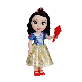 Disney Princess Snow White doll shown from the front holding a red hairbrush