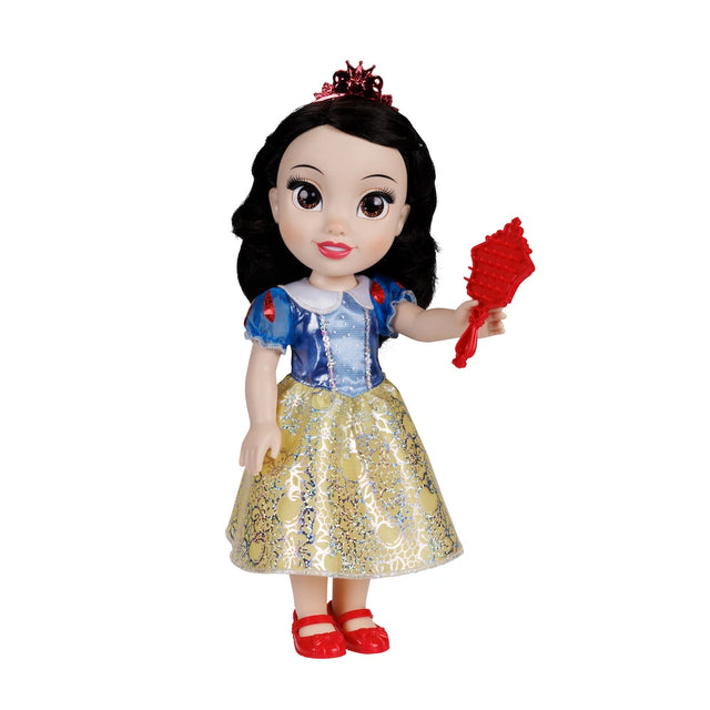 Disney Princess Snow White doll shown from the front holding a red hairbrush