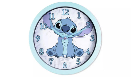 Disney Lilo and Stitch Wall Clock out of box showing full Stitch character dial and light blue casing