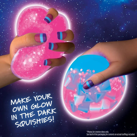 Two completed Doctor Squish glow in the dark squishies with pink filling, sparkles and blue decorative pieces
