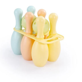 Pastel coloured bowling pins and balls grouped together on a white background