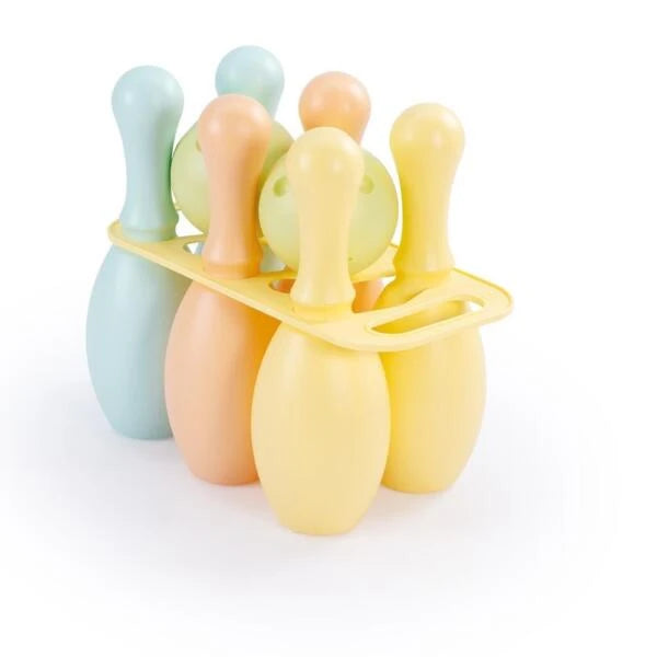 Pastel coloured bowling pins and balls with a yellow holder on a white background
