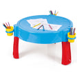 Blue Dolu activity table used as a desk with paper and pencils on a white background