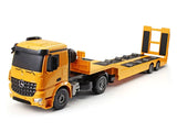 Mercedes Benz Arocs RC flatbed truck in yellow and grey with black wheels and realistic cab detailing
