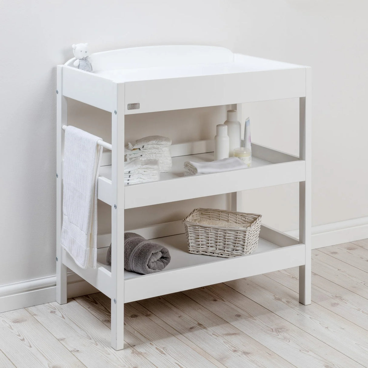 East Coast Clara Dresser White Changing Unit side view beside grey wall Ireland