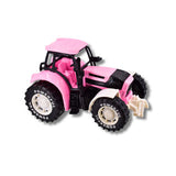 Eco Wheels Bio Plastic Tractor 21cm Pink in angled front view with black cab frame, white front mudguard and white front hitch