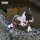 EUGY Horse model photographed outdoors on a rock