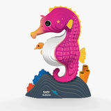 EUGY Seahorse 141 pink and purple model in side profile with orange baby seahorse, white belly, curled tail and colourful coral base