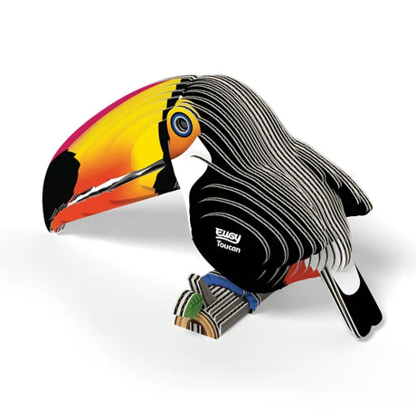 Completed EUGY Toucan 3D cardboard model with colourful gradient beak, black body and layered cardboard detailing