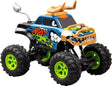 Exost Mega Beast RC car with orange jaw front, orange horns and large black tyres with green wheels