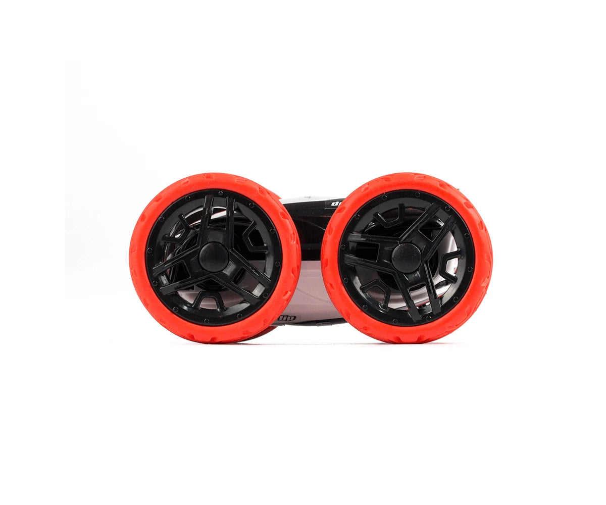Exost Mini Flip stunt car side view showing large red wheels and black body