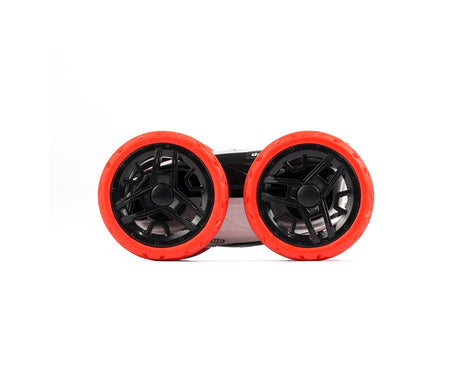 Exost Mini Flip stunt car side view showing large red wheels and black body