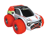 Exost Xtreme Buster RC car front angle view showing white body, red tyres and roof detail