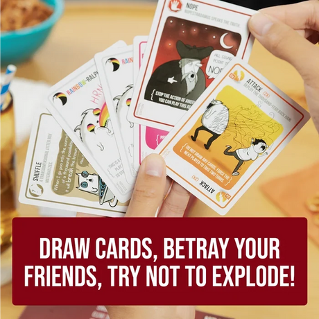 Closeup of Exploding Kittens playing cards held in two hands, including Attack, Nope, Shuffle and Rainbow Ralphing Cat cards.