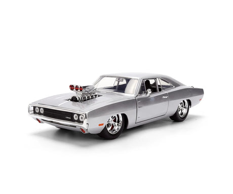 Fast & Furious Anniversary Dom's 1970 Dodge Charger in silver, viewed from the front and side, showing the exposed supercharged engine, black grille and chrome wheels.