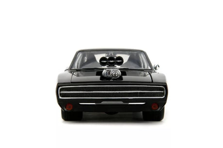 Fast & Furious 1970 Dodge Charger 1:24 diecast model in gloss black, straight-on front view showing chrome grille, supercharger blower and wide stance