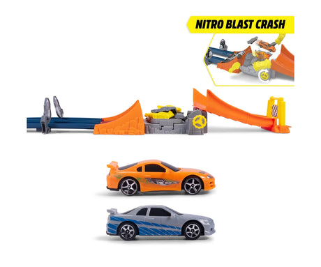 Fast & Furious Nitro Blast crash mechanism with blue track sections, orange ramps, grey centre mechanism and yellow turning wheel, with the two included diecast cars pictured below and a crash demonstration inset above.