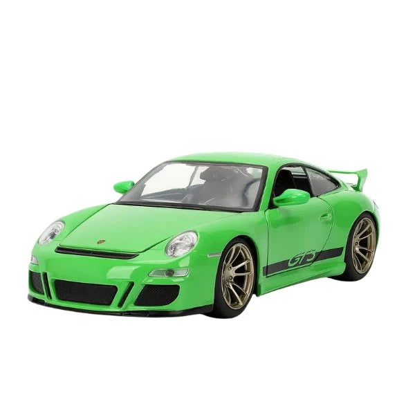 Fast & Furious Porsche 911 GT3 2007 1:24 scale diecast car in green with black GT3 side graphics and gold alloy wheels, front three-quarter view