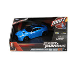 Fast & Furious RC Drift 2009 Nissan GT-R R35 Ben Sopra in black retail packaging with blue car, Drift Power Slide graphics and USB charging icon.