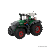 BRIXIES Plus Fendt 1052 Vario viewed from the front side with the front linkage, Fendt bonnet, red and blue hydraulic connections and enclosed cab visible
