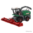 Front right view of the BRIXIES Plus Fendt Katana 65 showing the wide red harvesting header, enclosed cab, green body and raised discharge spout
