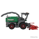 BRIXIES Plus Fendt Katana 65 in side profile with the harvesting header extending right, green Fendt bodywork, enclosed cab and large agricultural wheels visible