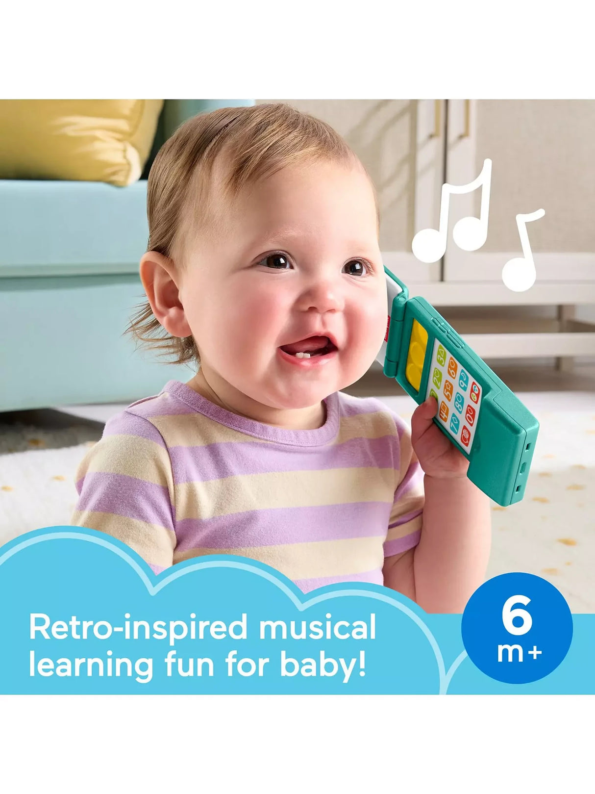 Baby holding the Fisher-Price Laugh & Learn Flip Phone toy to their ear