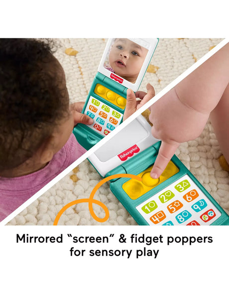 Fisher-Price Laugh & Learn Flip Phone mirror screen and yellow popper buttons in use