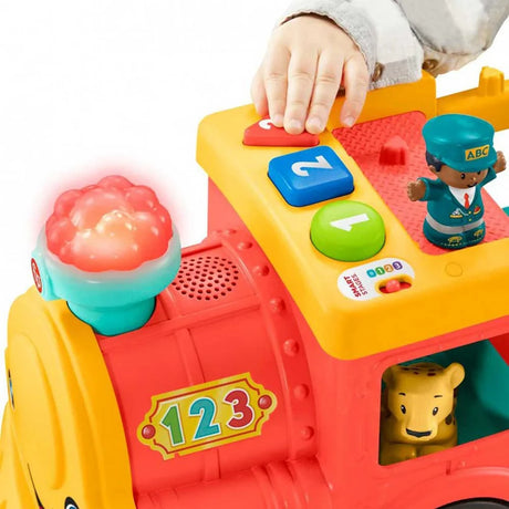 Close view of the number buttons and light up smokestack on the Fisher Price ABC Animal Train