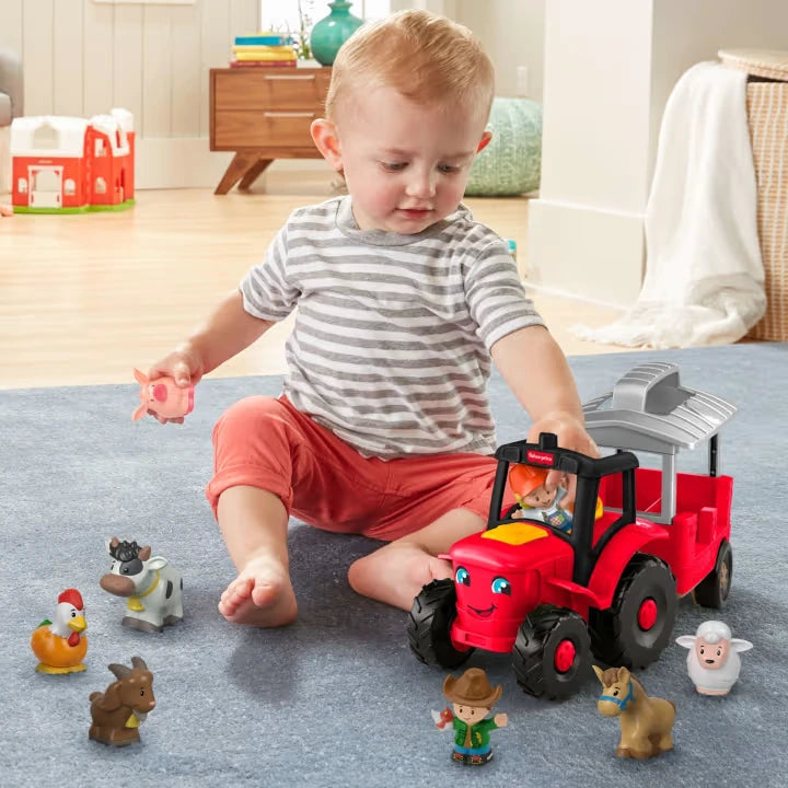 Fisher-Price Little People Caring for Animals Tractor with child pushing tractor among farmer and animal figures