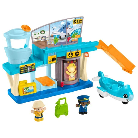 Fisher-Price Little People airport playset assembled with toy plane, two figures and green luggage piece