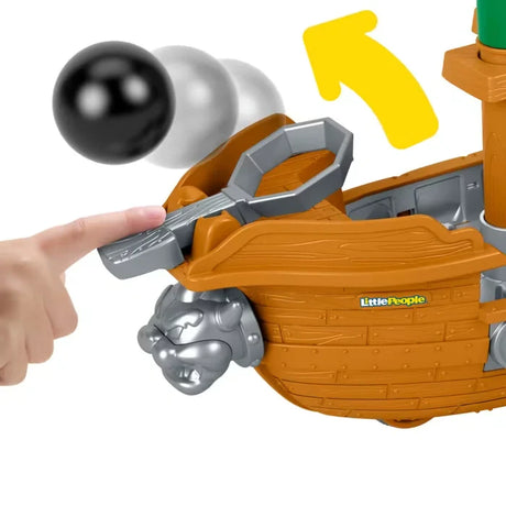 Close up of Bowser’s Airship cannonball launcher with black cannonball and yellow arrow graphic
