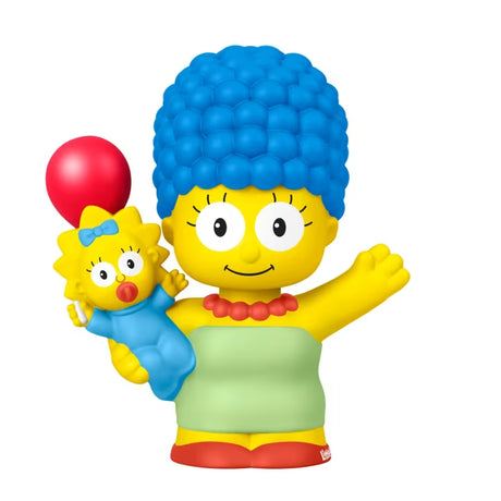 Fisher-Price Little People Marge figure holding Maggie, with blue hair, a green dress and a red balloon.