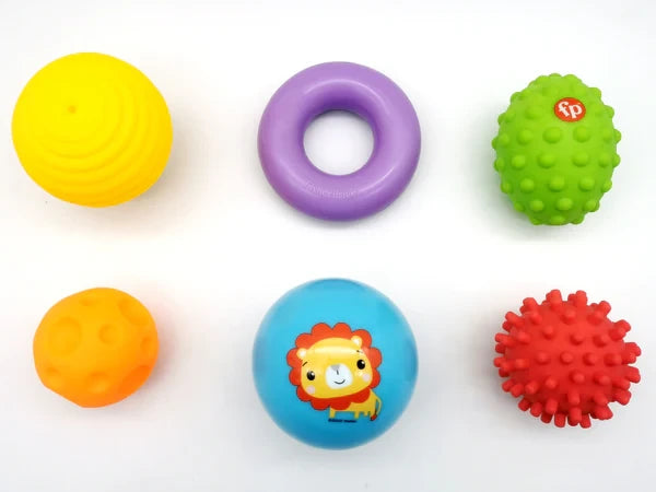 Fisher-Price sensory toy set with six colourful textured baby toys grouped together