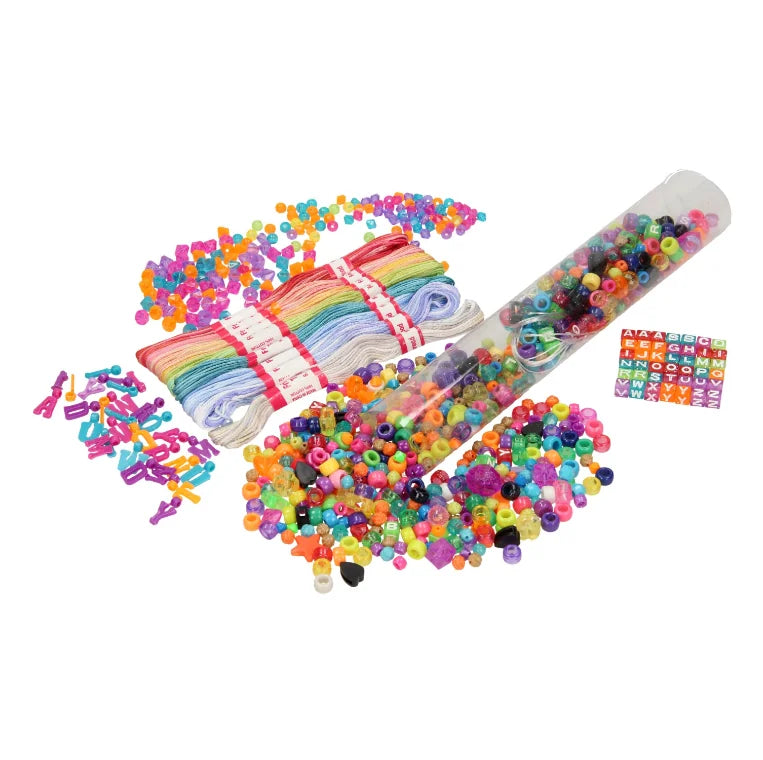 Friendship Bracelet set contents laid out with rainbow threads, alphabet cubes and assorted multicoloured beads