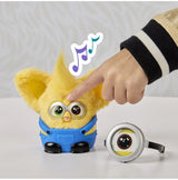 Furby Furblets Minions plush toy with head button being pressed for sounds