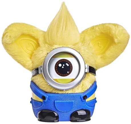 Furby Furblets Minions plush toy wearing blue overalls and goggle accessory