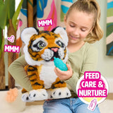 Child feeding FurReal Gabby the Grow & Roar Tiger with the blue bottle